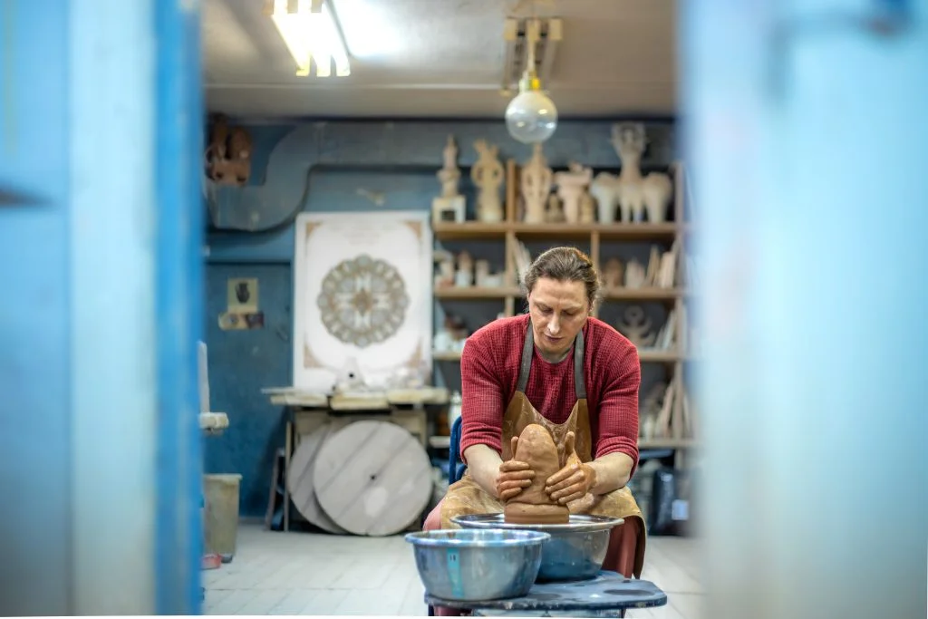 A potter working at the wheel