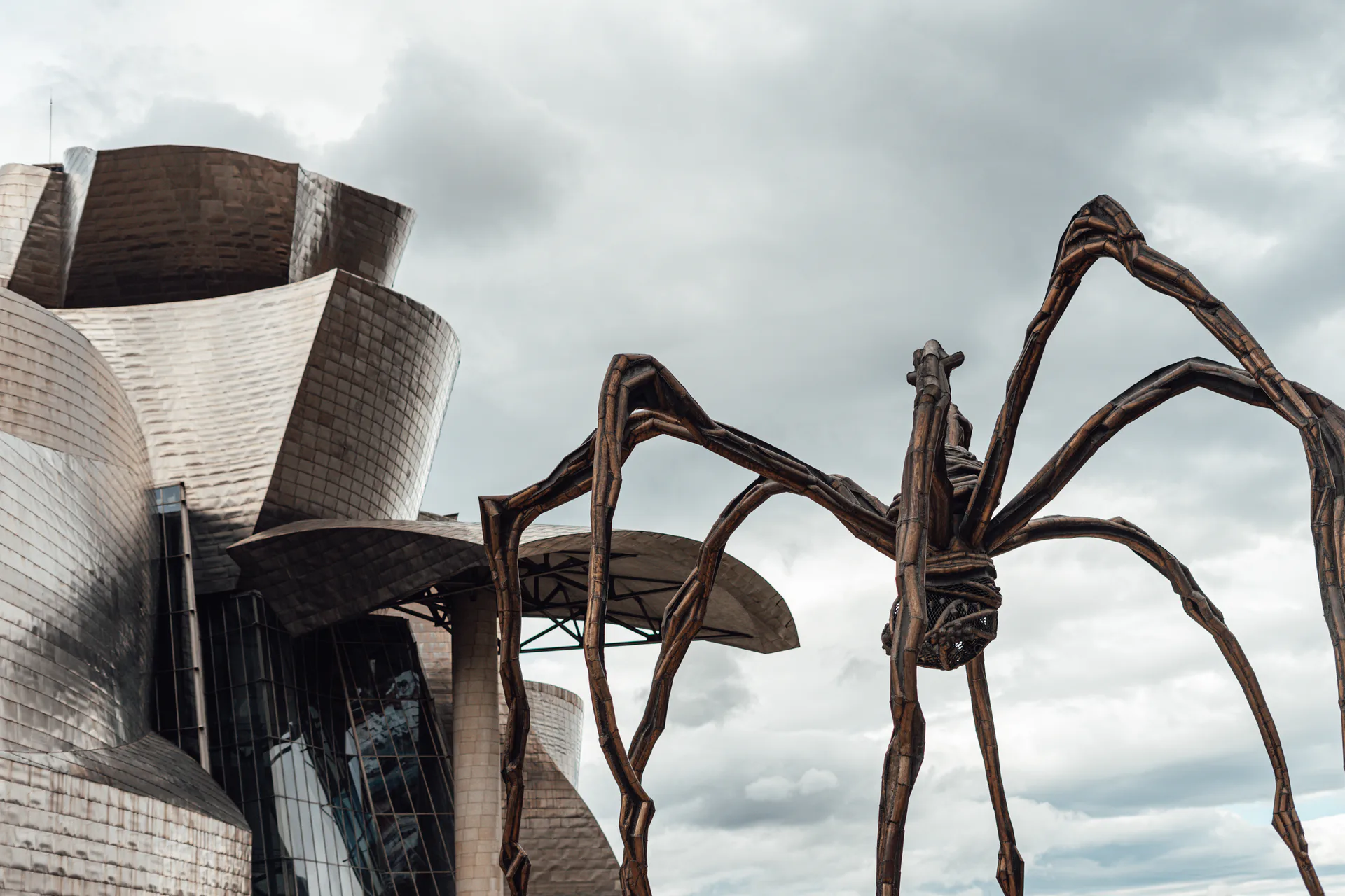 The Guggenheim Museum Bilbao beside a large bronze spider
