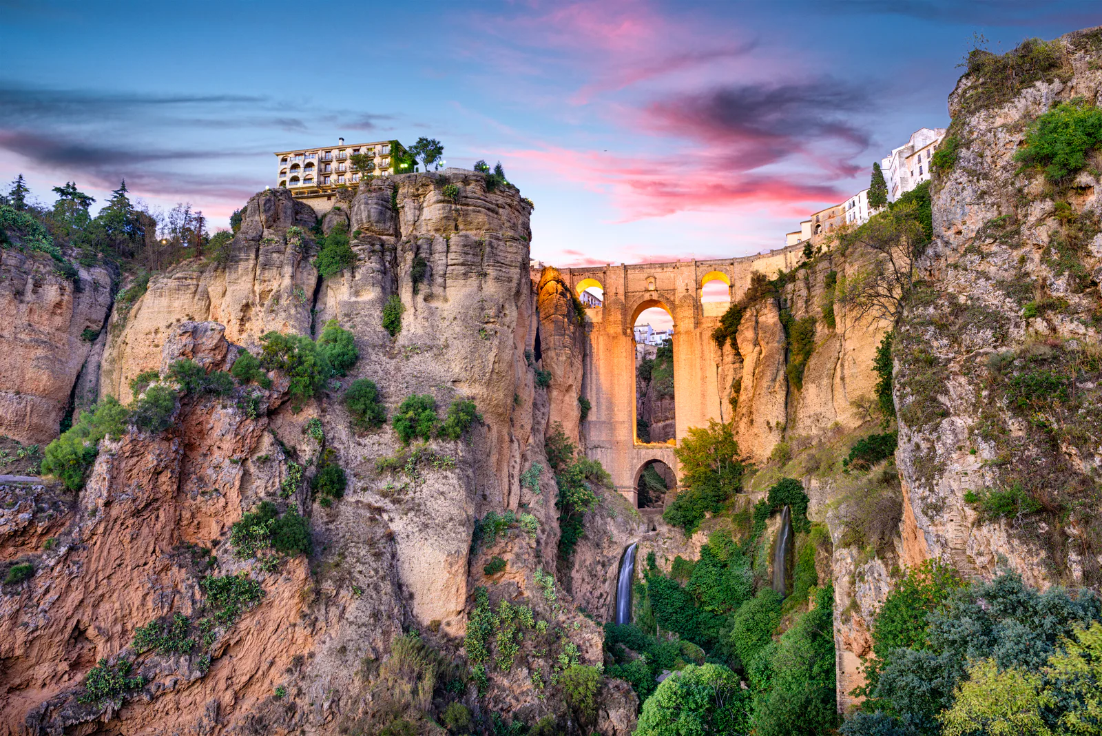 The bridge at Ronda spanning a gorge at sunset