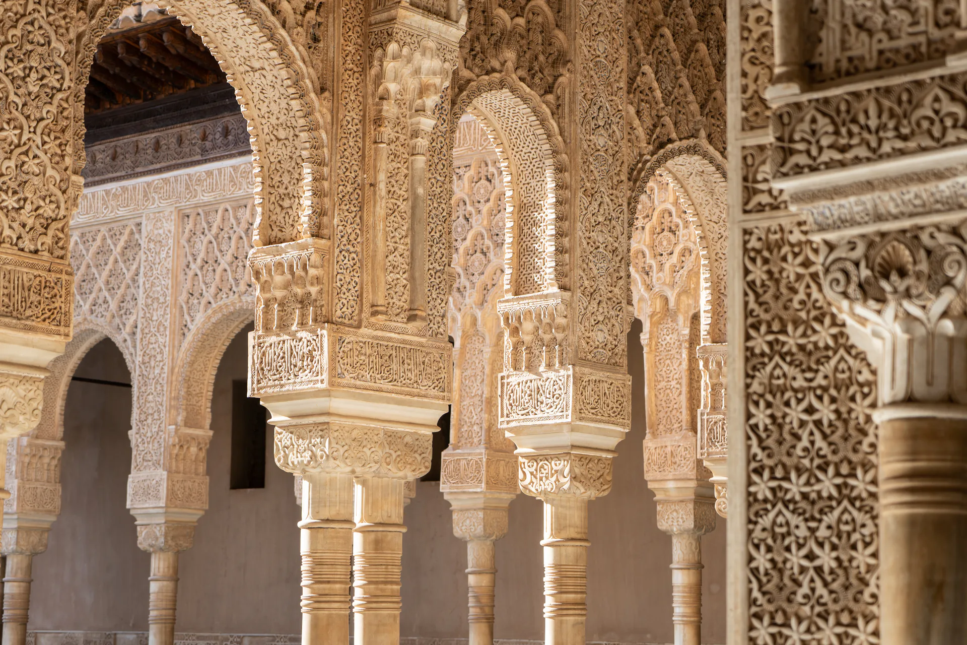 Carved horseshoe arches in a historic hall